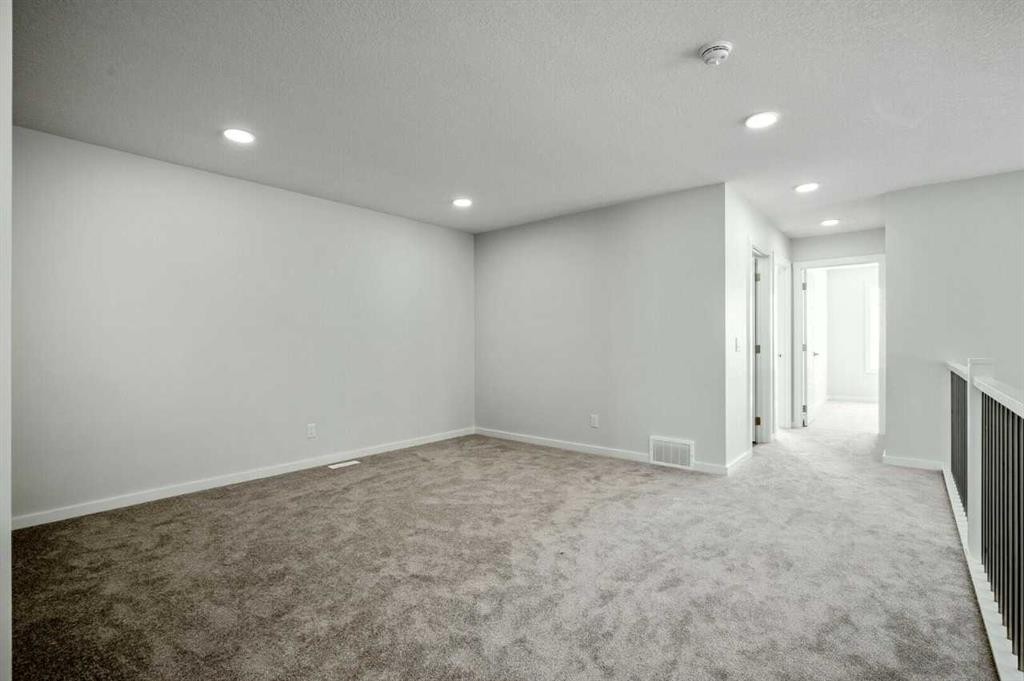 18 Heartwood Villas Se, Calgary, AB - Indoor Photo Showing Other Room