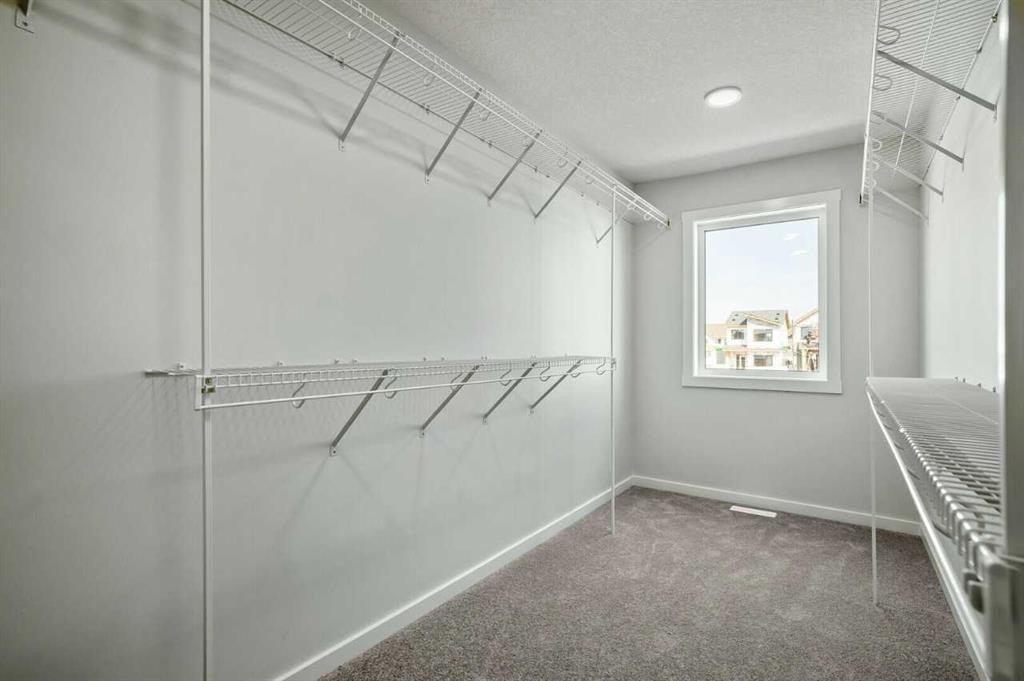 18 Heartwood Villas Se, Calgary, AB - Indoor With Storage