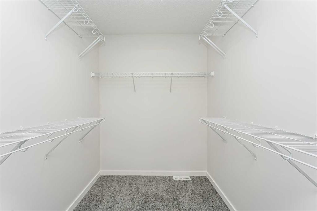 147 Lincoln Crescent, Rural Red Deer County, AB - Indoor With Storage