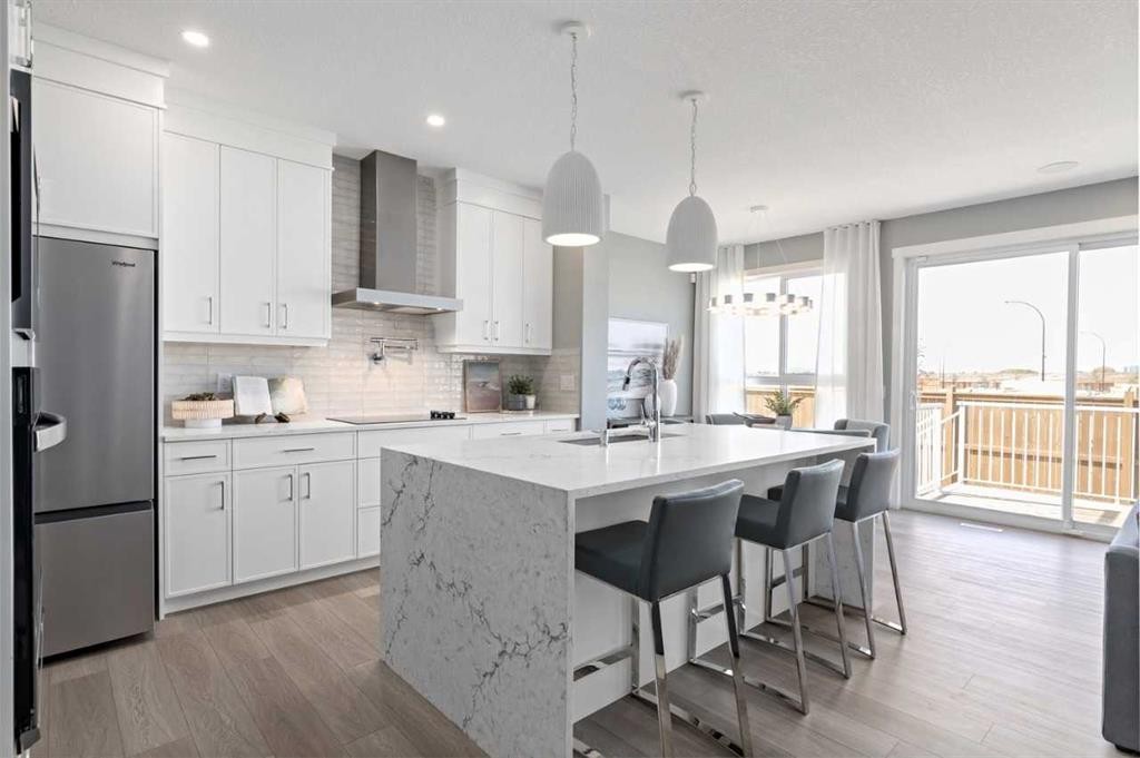 207 Huxland Path, Calgary, AB - Indoor Photo Showing Kitchen With Upgraded Kitchen