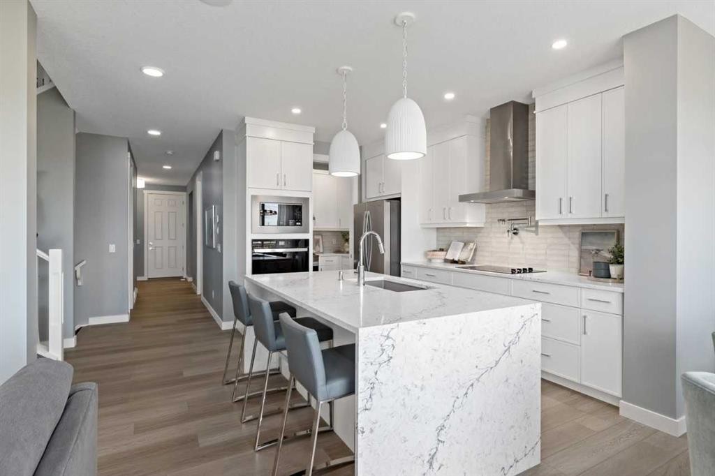 207 Huxland Path, Calgary, AB - Indoor Photo Showing Kitchen With Upgraded Kitchen