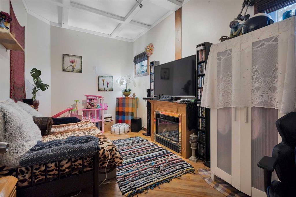 4824 50 Street, Clive, AB - Indoor With Fireplace