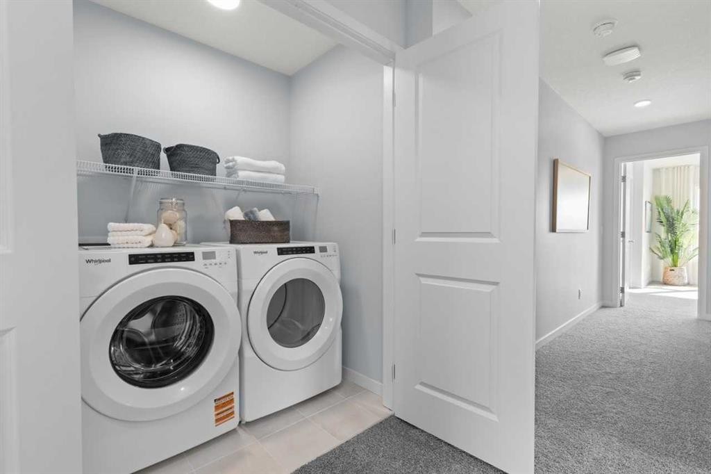 139 Huxland Road Ne, Calgary, AB - Indoor Photo Showing Laundry Room