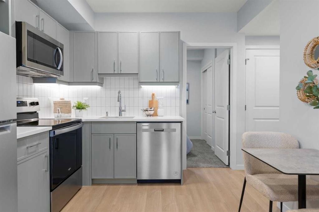 139 Huxland Road Ne, Calgary, AB - Indoor Photo Showing Kitchen With Upgraded Kitchen