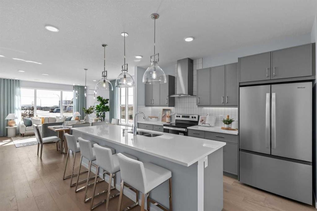 139 Huxland Road Ne, Calgary, AB - Indoor Photo Showing Kitchen With Double Sink With Upgraded Kitchen