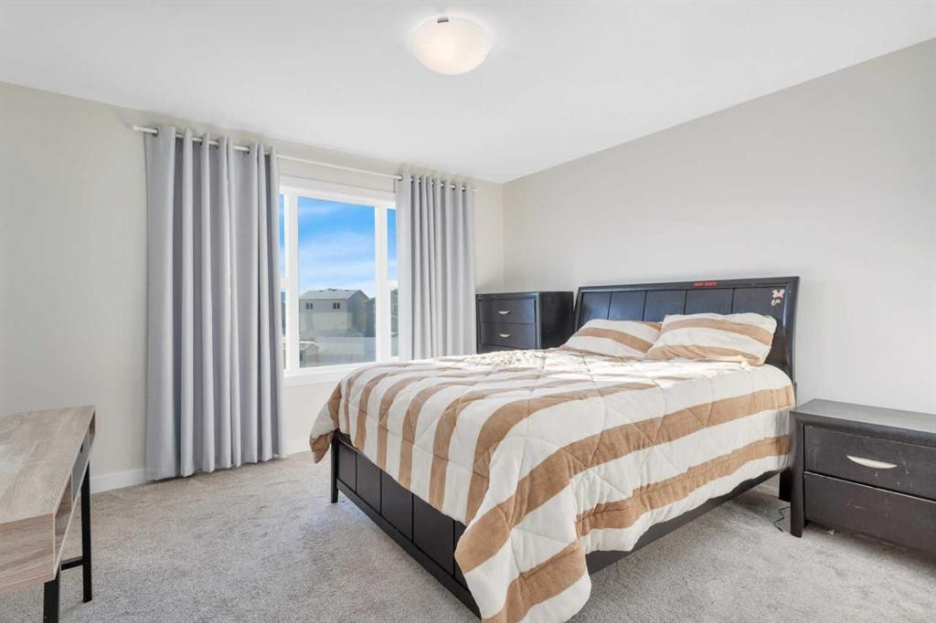 22 Latoria Court, Rural Red Deer County, AB - Indoor Photo Showing Bedroom