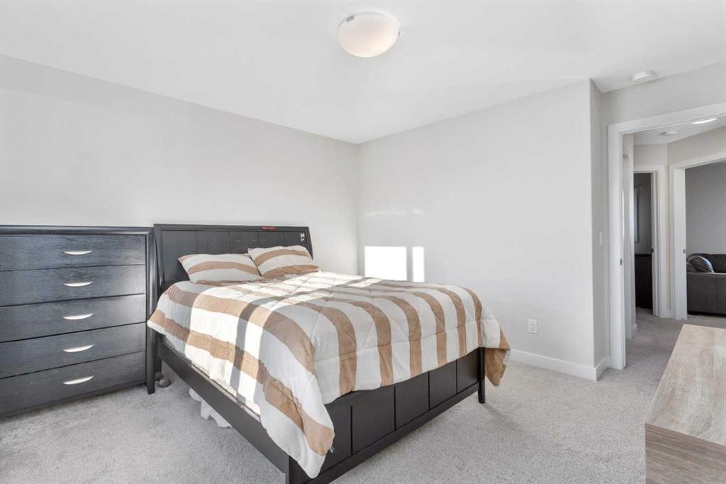 22 Latoria Court, Rural Red Deer County, AB - Indoor Photo Showing Bedroom