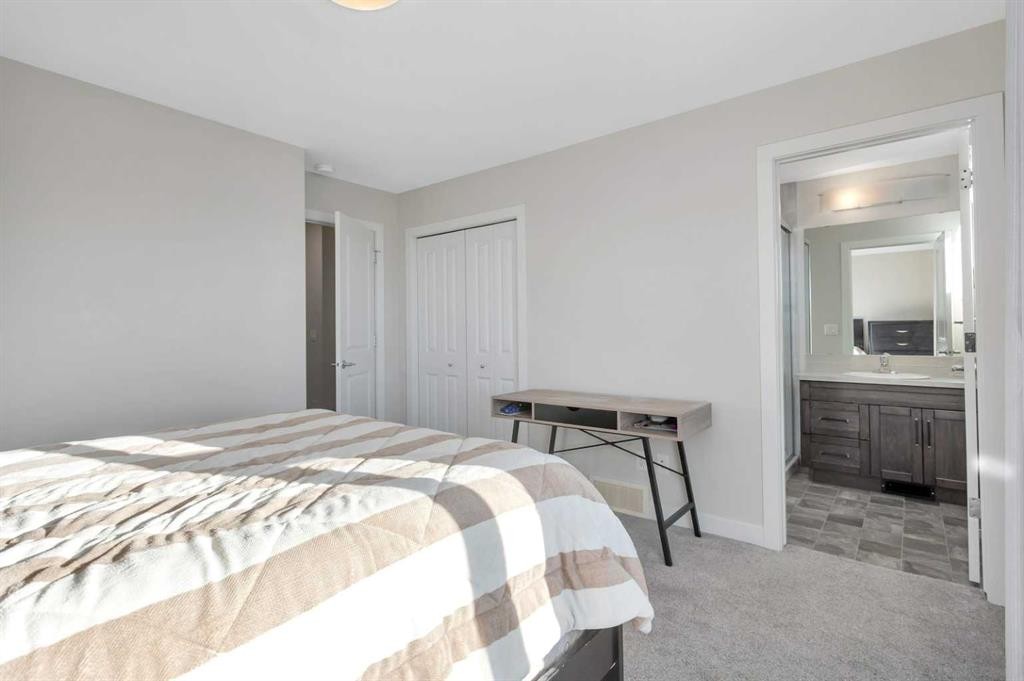 22 Latoria Court, Rural Red Deer County, AB - Indoor Photo Showing Bedroom