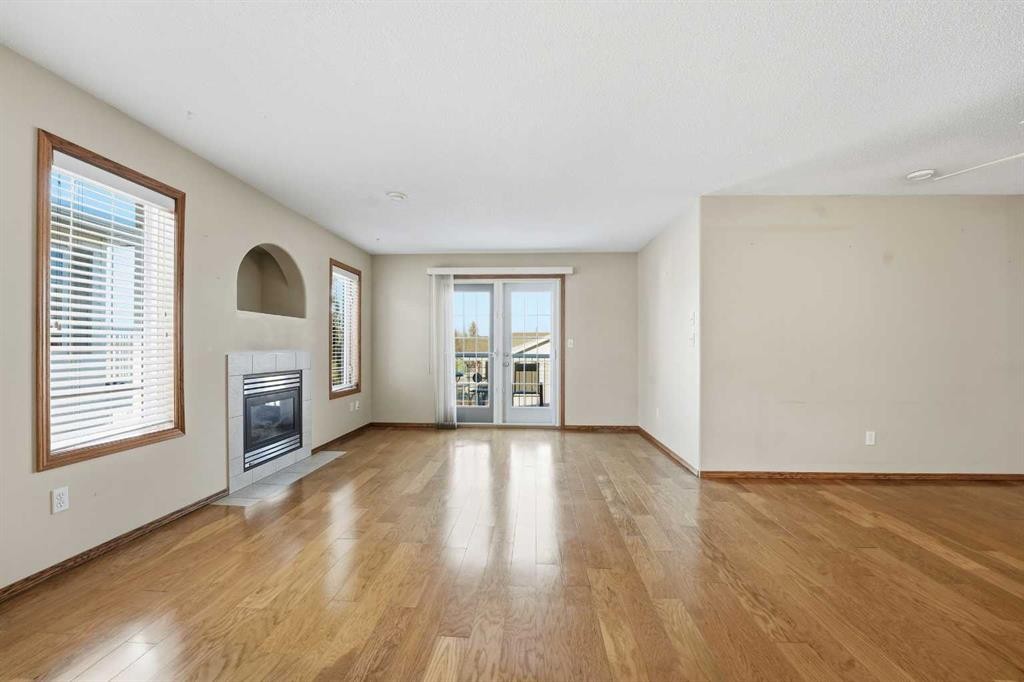 24D-32 Daines Avenue, Red Deer, AB - Indoor With Fireplace