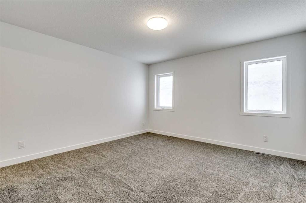 1123 Fowler Road Sw, Airdrie, AB - Indoor Photo Showing Other Room