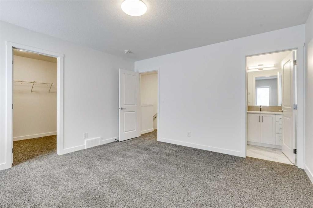 1123 Fowler Road Sw, Airdrie, AB - Indoor Photo Showing Other Room