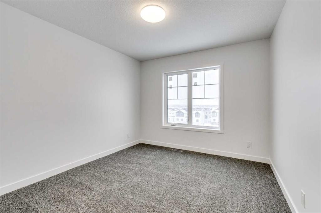 1123 Fowler Road Sw, Airdrie, AB - Indoor Photo Showing Other Room