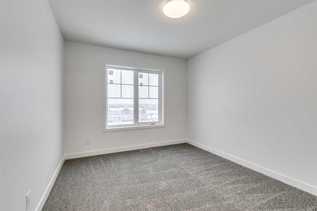 1123 Fowler Road Sw, Airdrie, AB - Indoor Photo Showing Other Room