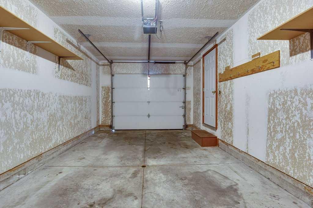 16 Lawrence Crescent, Red Deer, AB - Indoor Photo Showing Garage