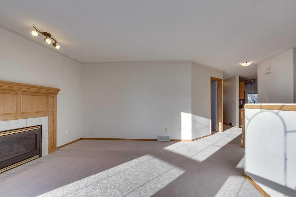 16 Lawrence Crescent, Red Deer, AB - Indoor With Fireplace