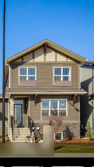 135 Huxland Road Ne, Calgary, AB - Outdoor With Facade