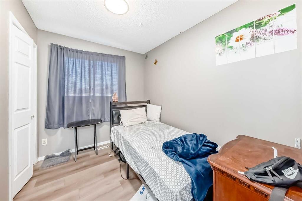 B1-35 Nash, Red Deer, AB - Indoor Photo Showing Bedroom