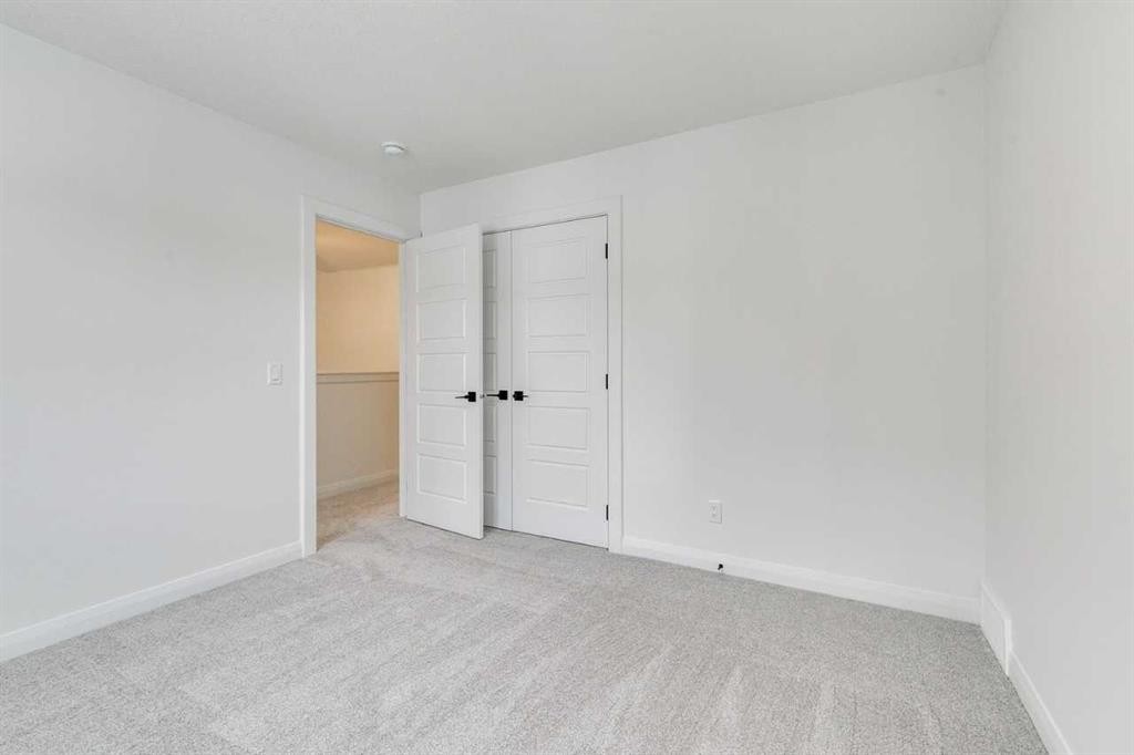285 Creekstone Hill Sw, Calgary, AB - Indoor Photo Showing Other Room