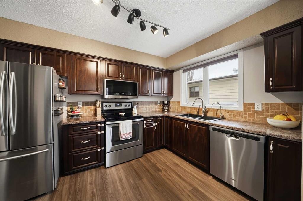 59 Baird Street, Red Deer, AB - Indoor Photo Showing Kitchen With Double Sink