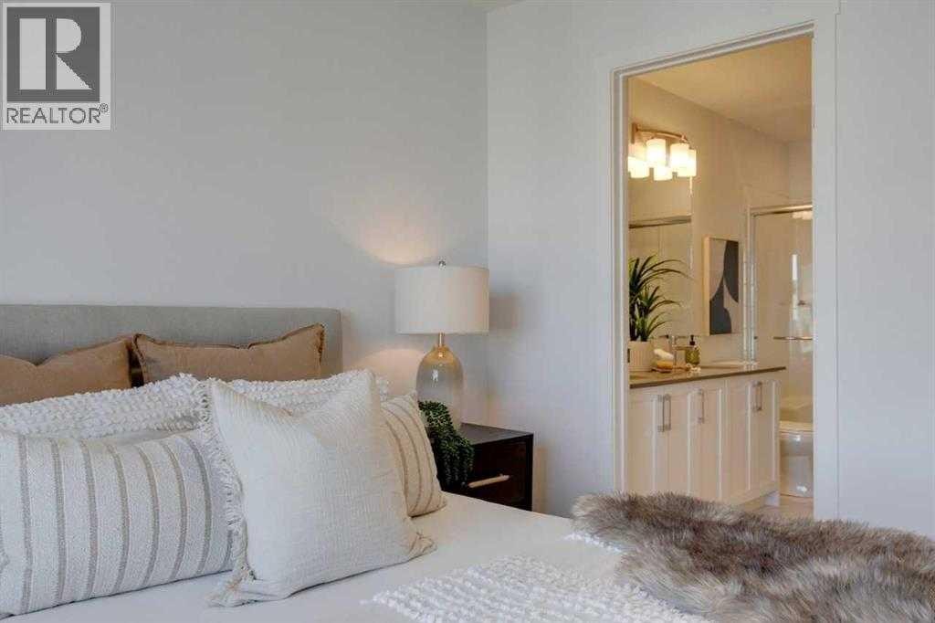 438-65 Belvedere Pointe Se, Calgary, AB - Indoor Photo Showing Bedroom