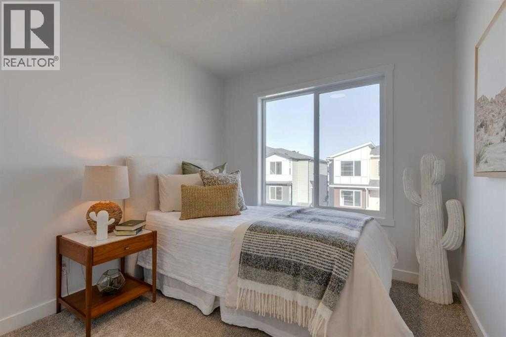 438-65 Belvedere Pointe Se, Calgary, AB - Indoor Photo Showing Bedroom