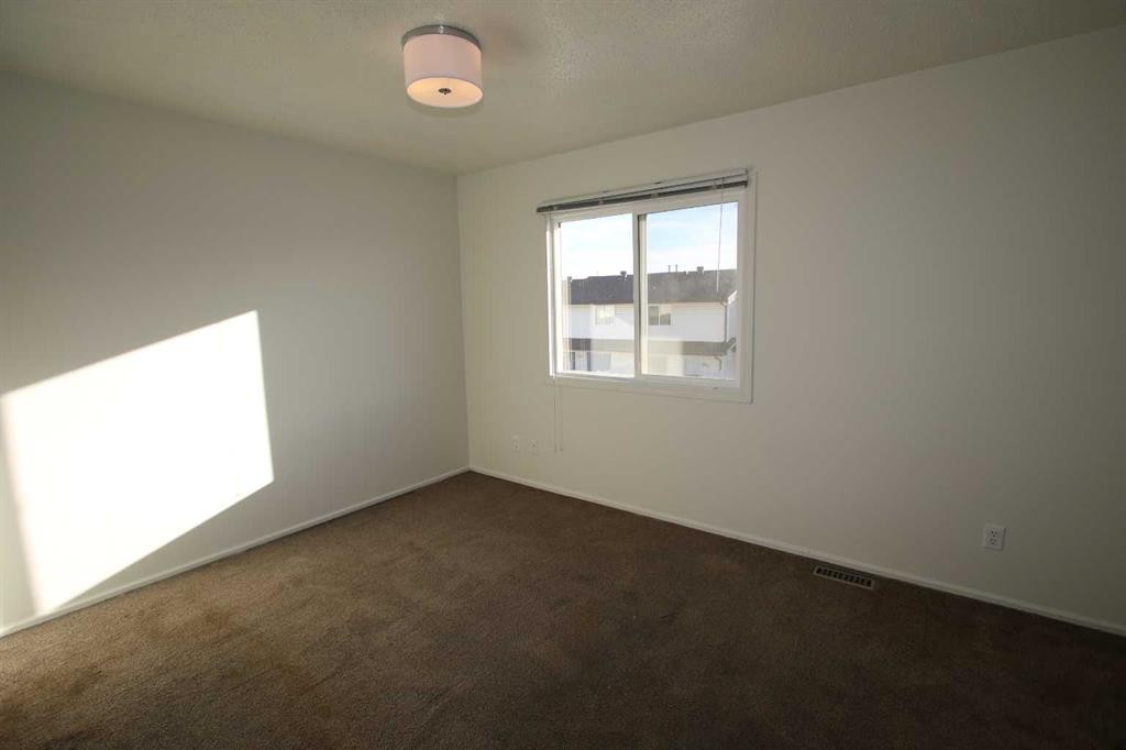 44-7124 Gray Drive, Red Deer, AB - Indoor Photo Showing Other Room