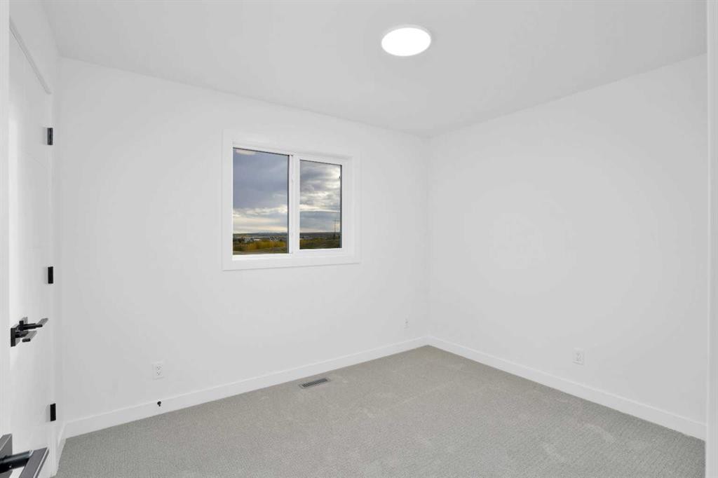 18 Palmer Circle, Blackfalds, AB - Indoor Photo Showing Other Room