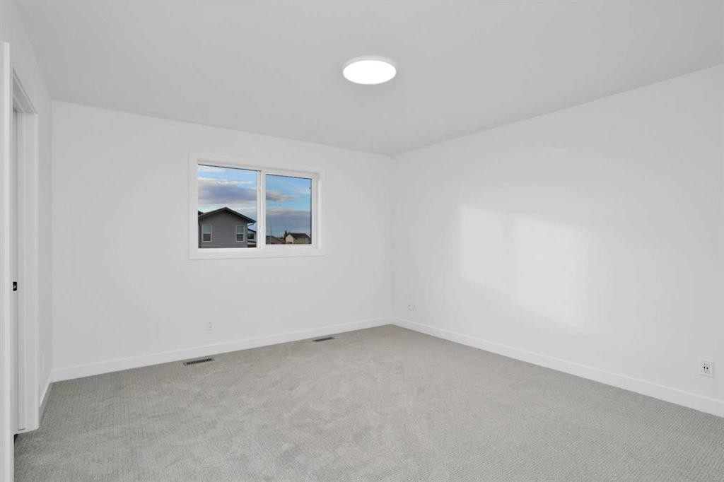 18 Palmer Circle, Blackfalds, AB - Indoor Photo Showing Other Room