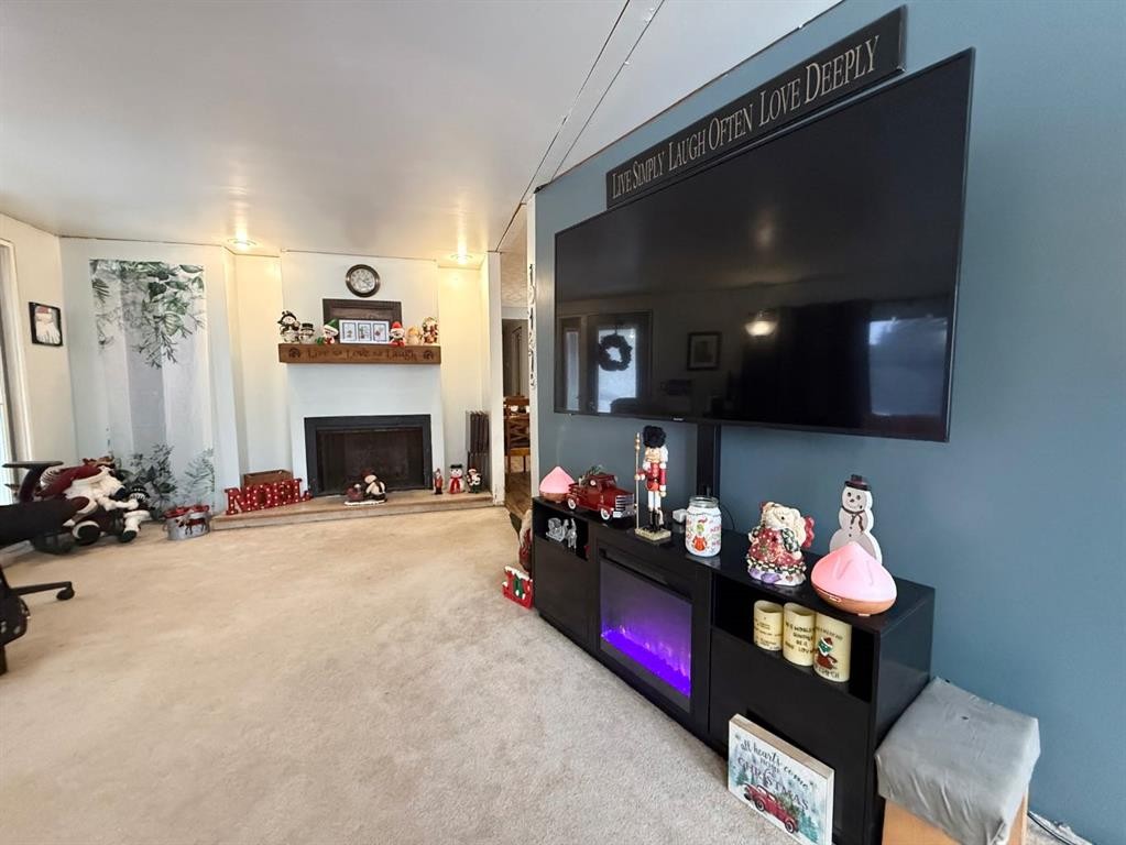 5922 Spruce Park Crescent, Stettler, AB - Indoor With Fireplace