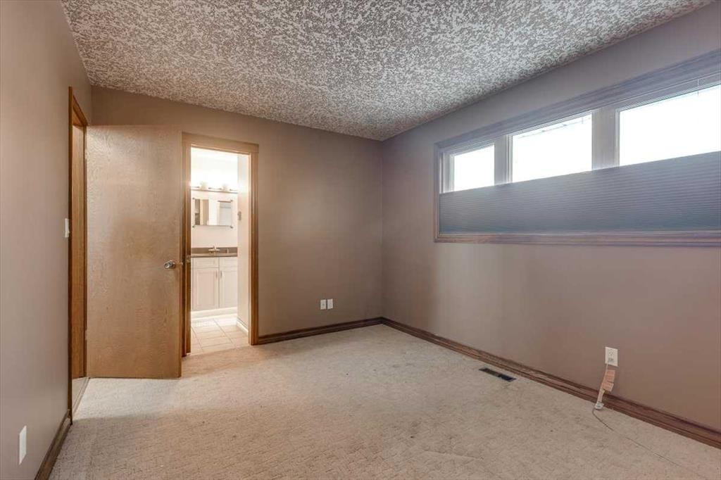 8 Nielsen Close, Red Deer, AB - Indoor Photo Showing Other Room