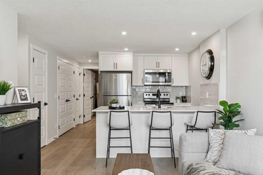 201-135 Mahogany Parade Se, Calgary, AB - Indoor Photo Showing Kitchen With Upgraded Kitchen