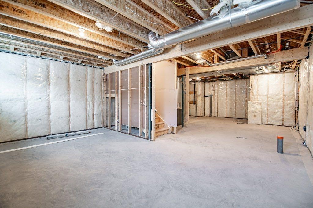83 Linden Place, Rural Red Deer County, AB - Indoor Photo Showing Basement