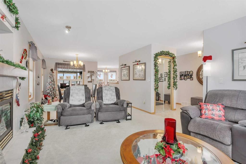 5233 45 Avenue, Rimbey, AB - Indoor Photo Showing Living Room With Fireplace