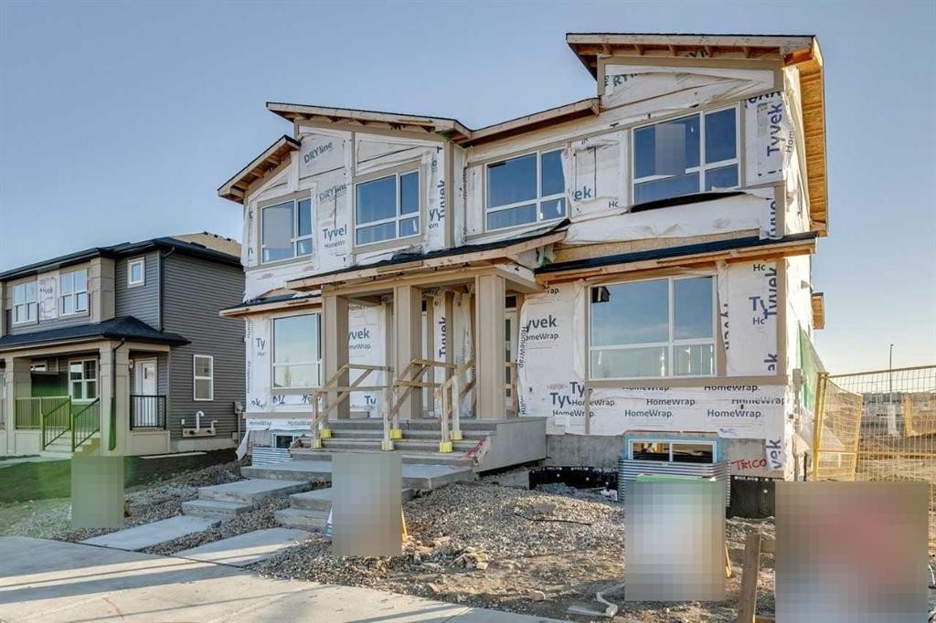 121 Bridgeport Gate North, Chestermere, AB - Outdoor With Facade
