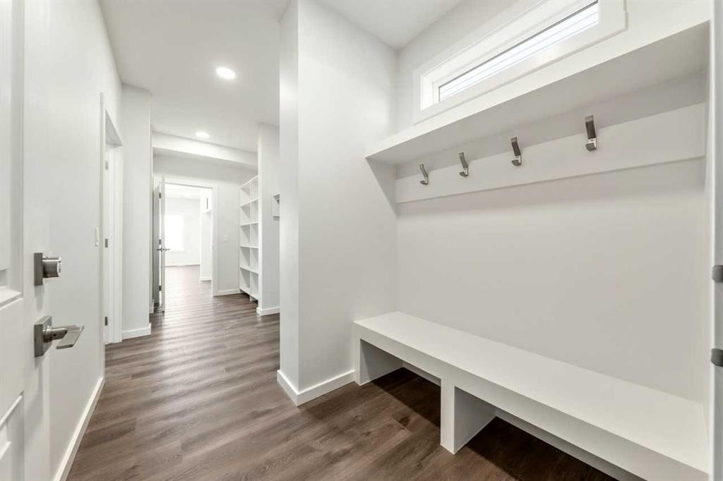 8 Heritage Link, Cochrane, AB - Indoor Photo Showing Other Room