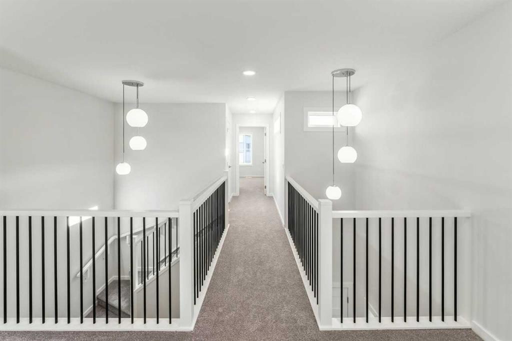 8 Heritage Link, Cochrane, AB - Indoor Photo Showing Other Room