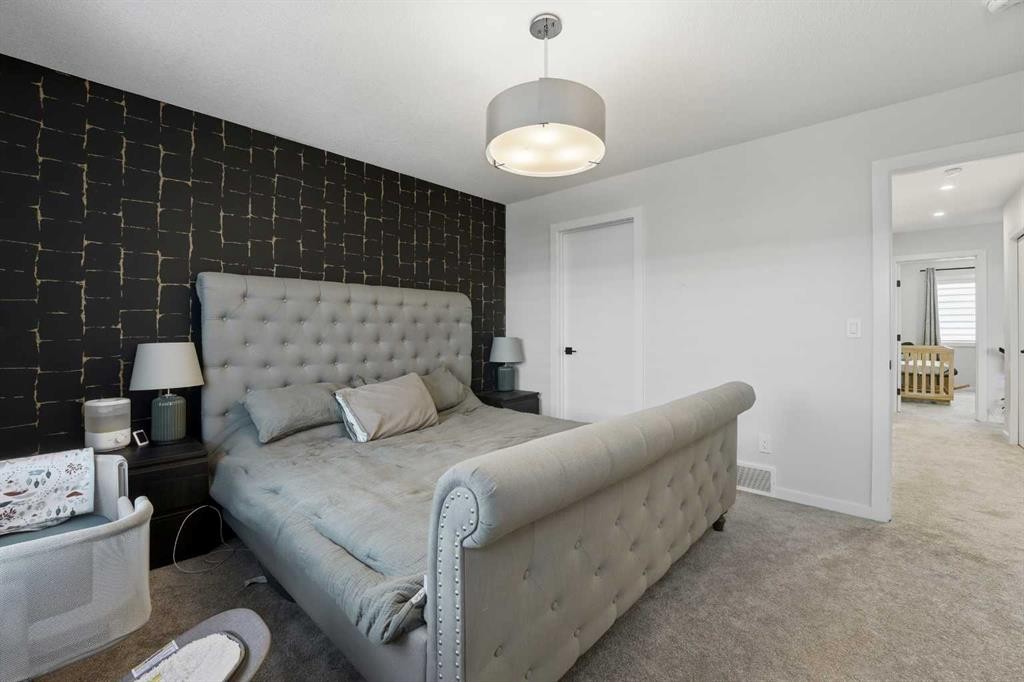 51 Lake Street, Rural Red Deer County, AB - Indoor Photo Showing Bedroom