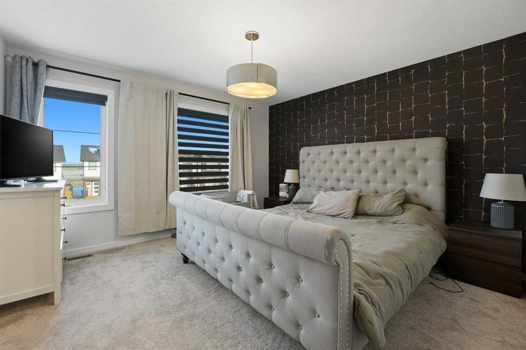 51 Lake Street, Rural Red Deer County, AB - Indoor Photo Showing Bedroom
