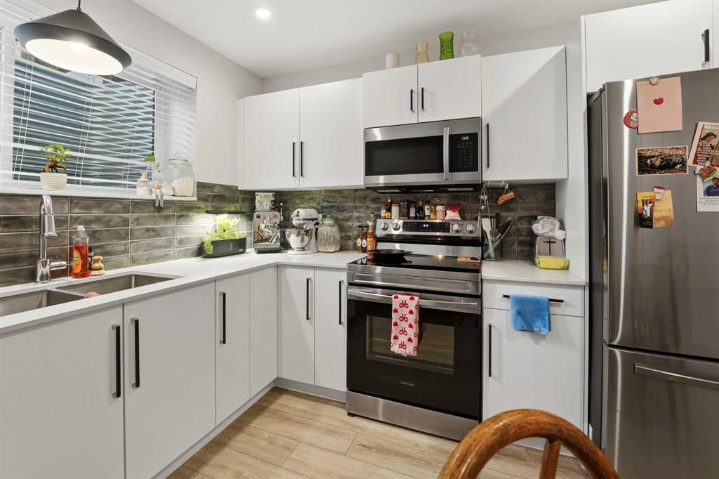 51 Lake Street, Rural Red Deer County, AB - Indoor Photo Showing Kitchen