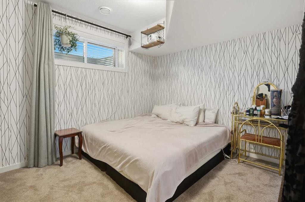 51 Lake Street, Rural Red Deer County, AB - Indoor Photo Showing Bedroom