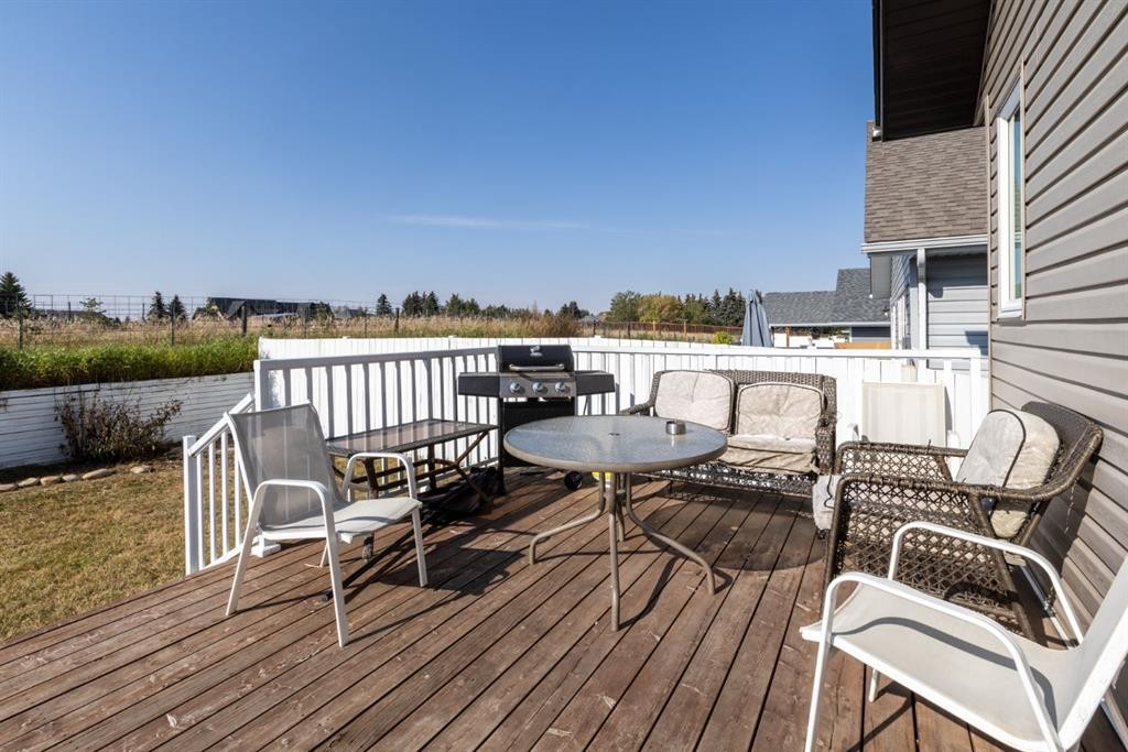 6321 58 Avenue, Innisfail, AB - Outdoor With Deck Patio Veranda With Exterior