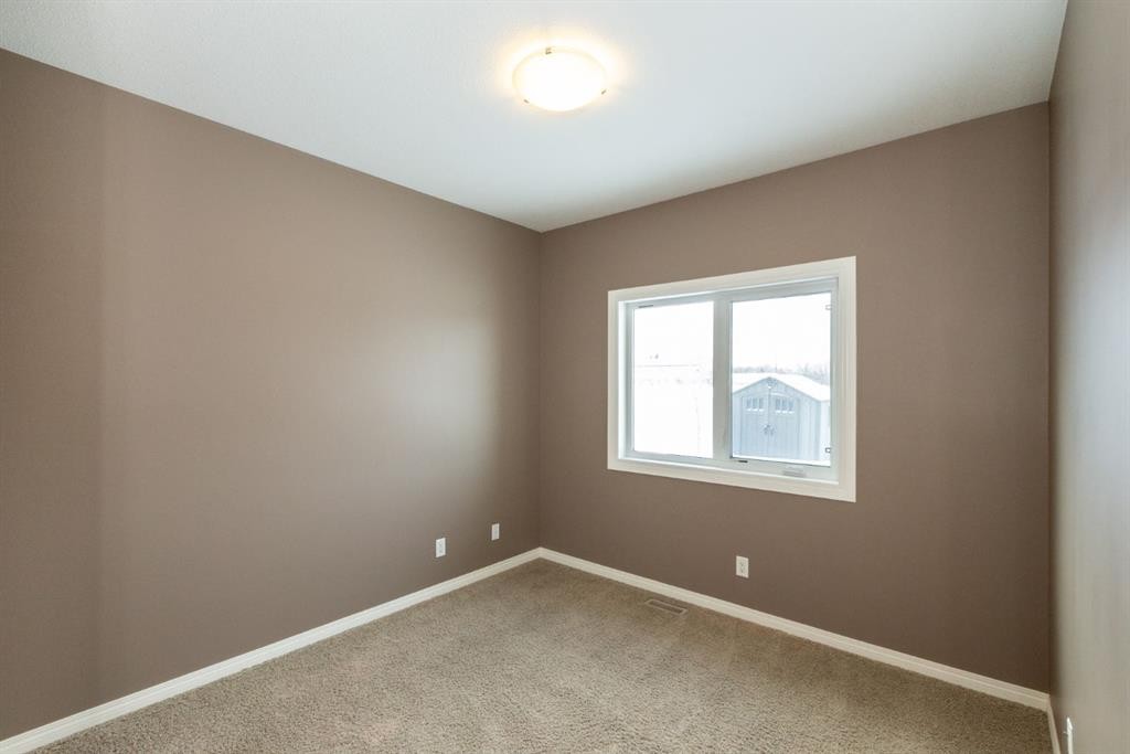 6321 58 Avenue, Innisfail, AB - Indoor Photo Showing Other Room