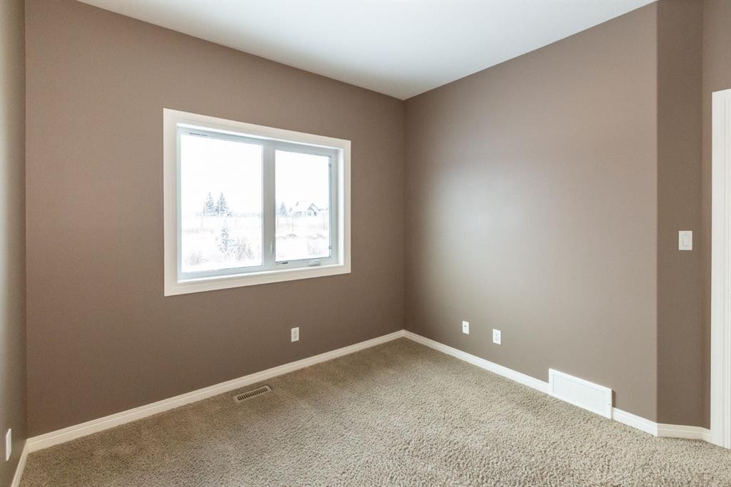 6321 58 Avenue, Innisfail, AB - Indoor Photo Showing Other Room