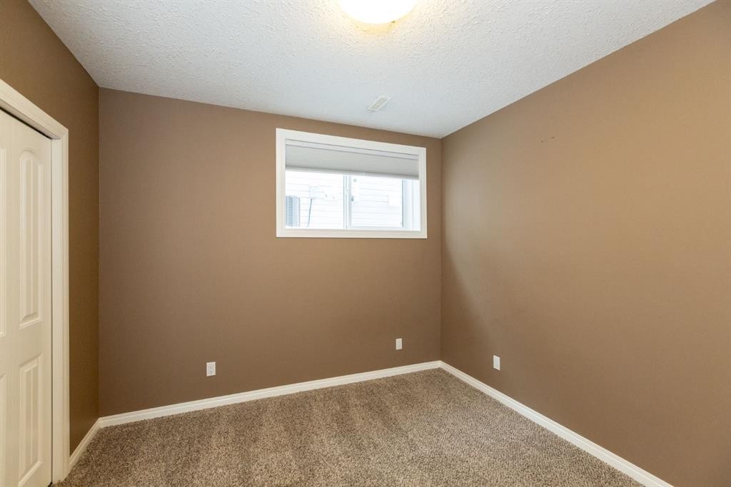 6321 58 Avenue, Innisfail, AB - Indoor Photo Showing Other Room