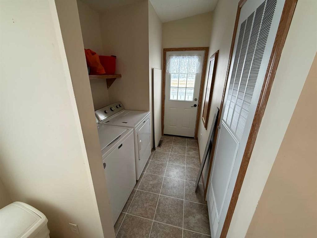 23 Cherry Lane Se, Three Hills, AB - Indoor Photo Showing Laundry Room