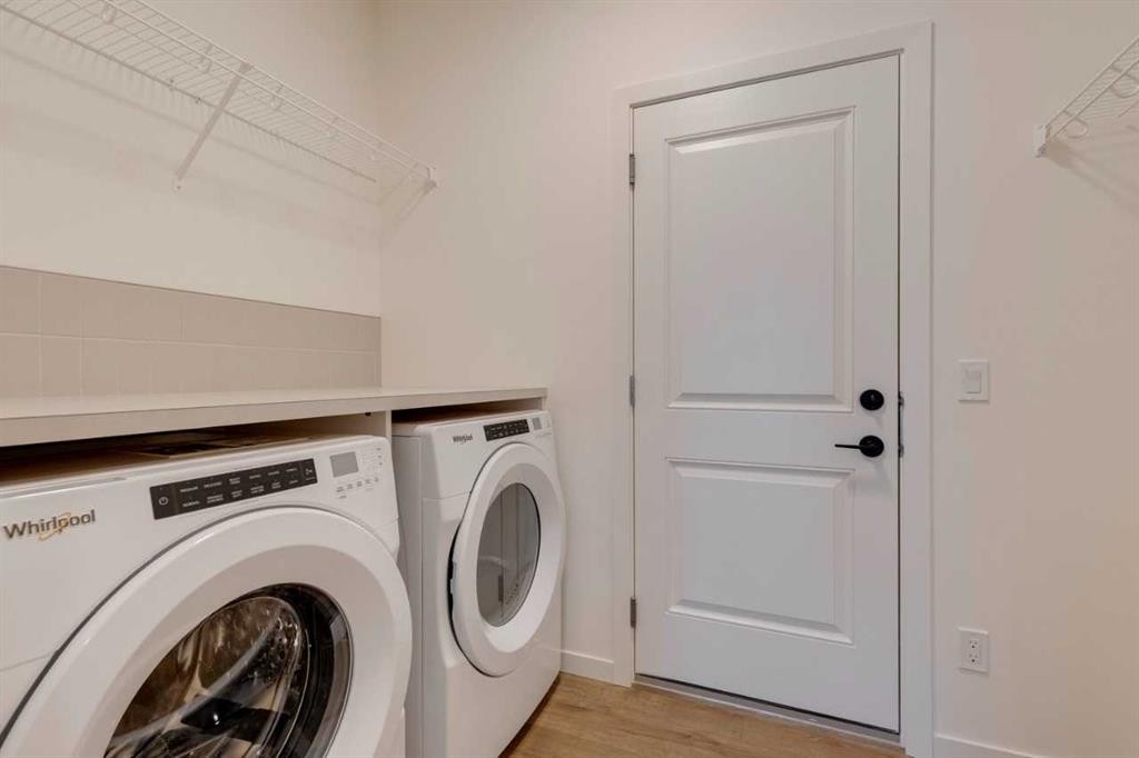 1402 Bayview Crescent Sw, Airdrie, AB - Indoor Photo Showing Laundry Room