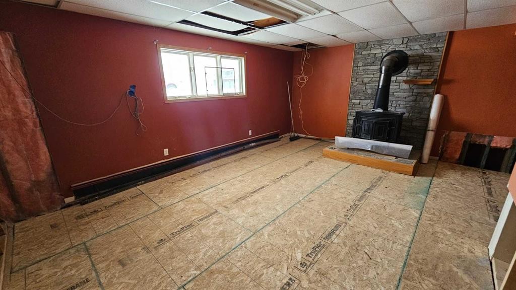 5006 Alexander Avenue, Coronation, AB - Indoor Photo Showing Other Room With Fireplace