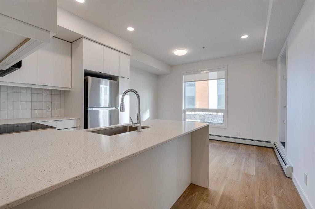 3217-8500 19 Avenue Se, Calgary, AB - Indoor Photo Showing Kitchen With Upgraded Kitchen