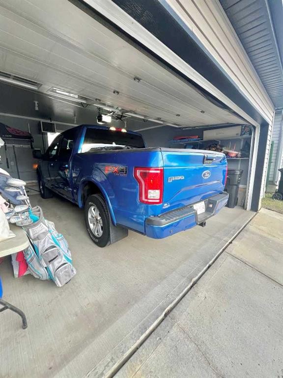 9340 211 Street Nw, Edmonton, AB - Indoor Photo Showing Garage