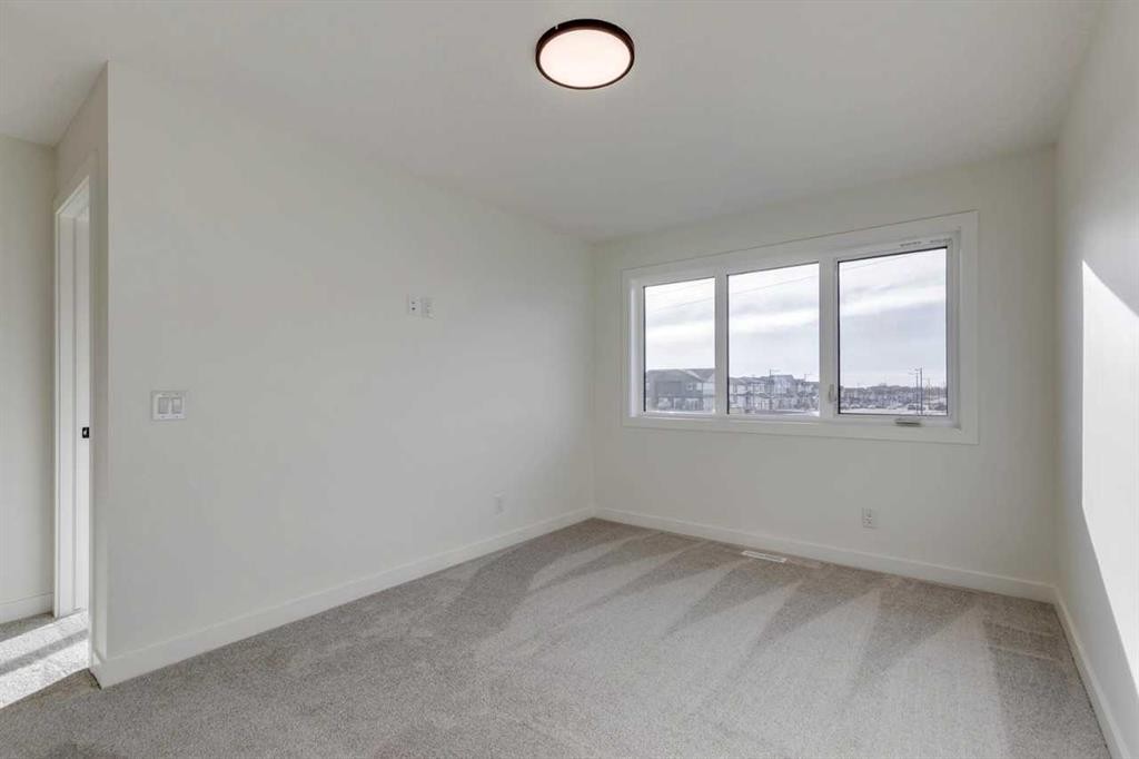 307 Dawson Dock Way, Chestermere, AB - Indoor Photo Showing Other Room